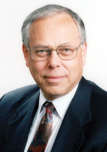 Frank Borowicz, K.C., Arbitrator, Vancouver, British Columbia.